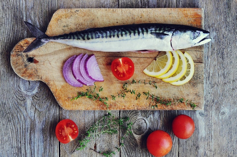 Raw mackerel with tomatoes and chopped onions