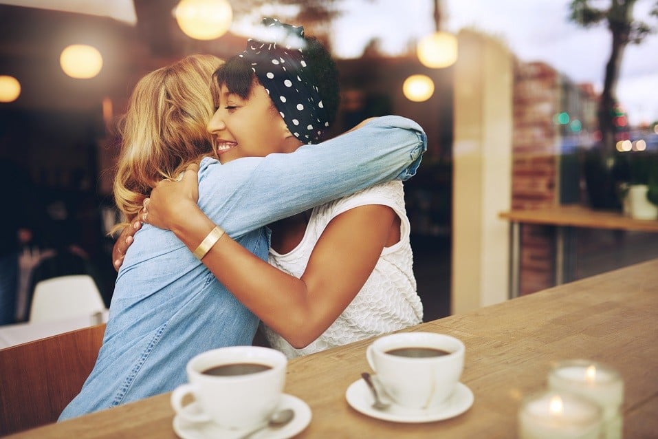 Two women embracing