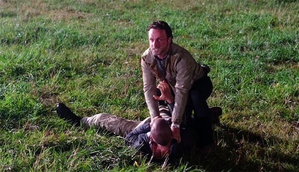 Rick holds Shane down on the ground in a scene from 'The Walking Dead' episode 'Better Angels'