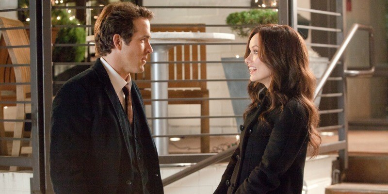 Ryan Reynolds and Olivia Wilde talking to each other in The Change-Up