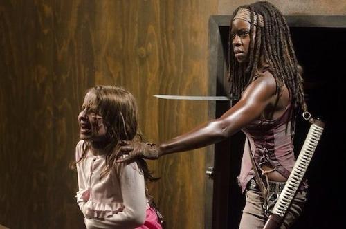 Michonne holds a zombified Penny in 'The Walking Dead' episode 'Made to Suffer'