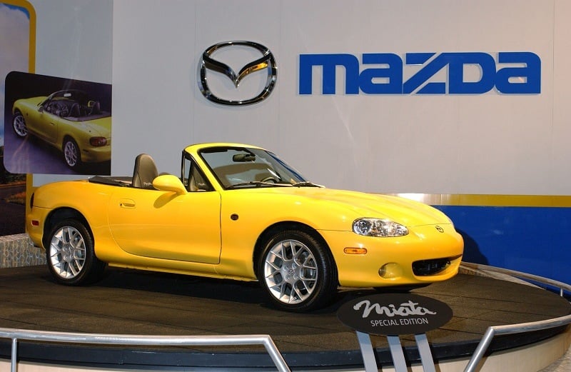 Miata 2002 special edition in blazing yellow mica at Chicago Auto Show