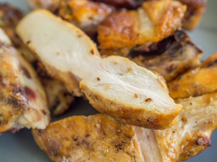 Grilled chicken pieces in the dish