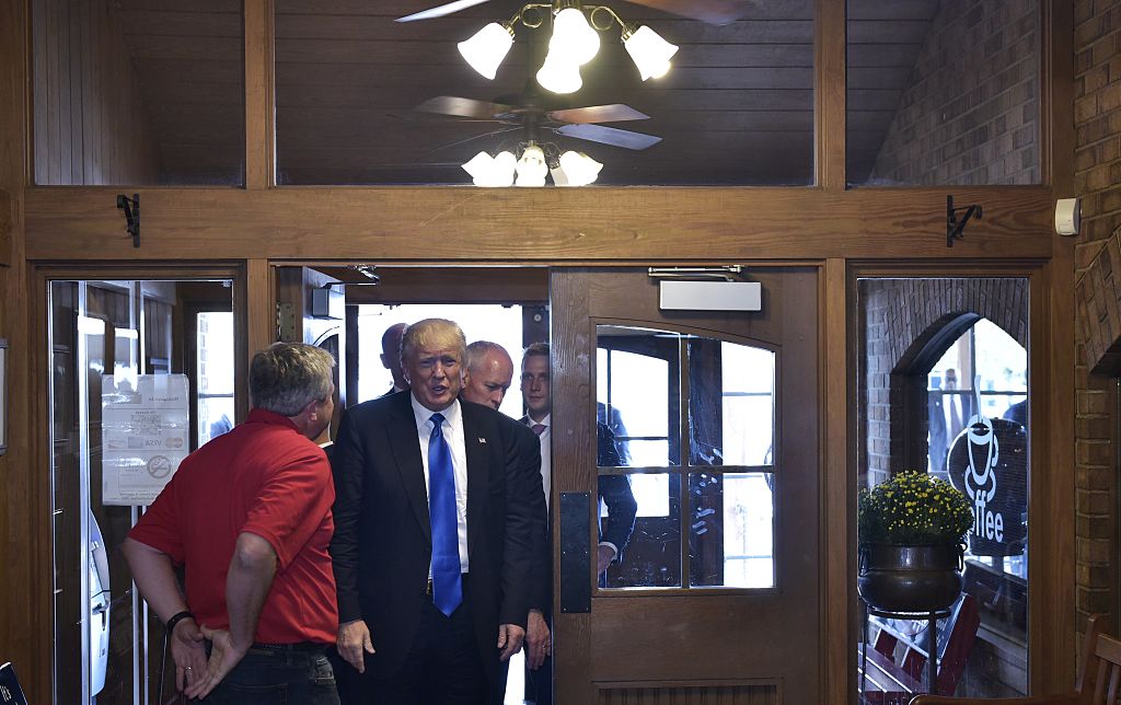 Donald Trump arrives for lunch at a restaurant.