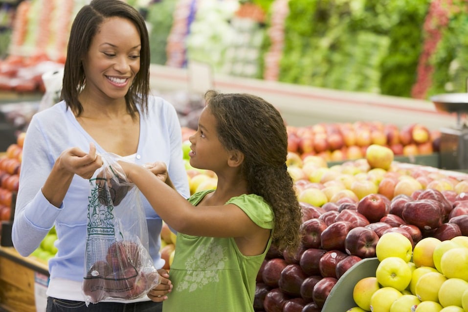 Customers shop for produce. Customers shop for produce.