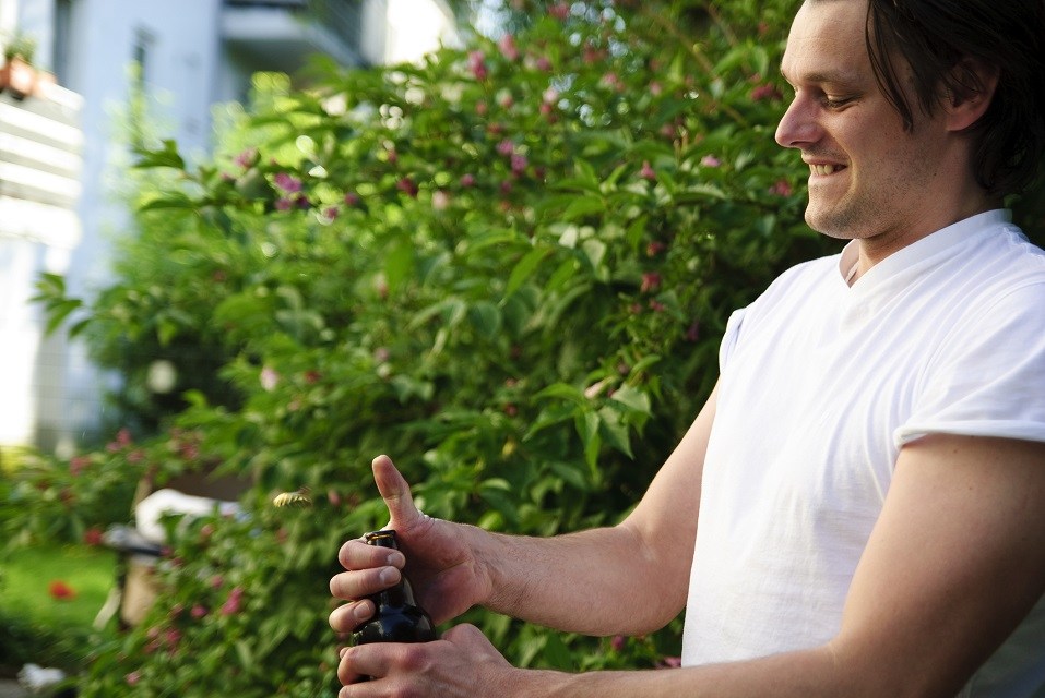 Opening a beer bottle
