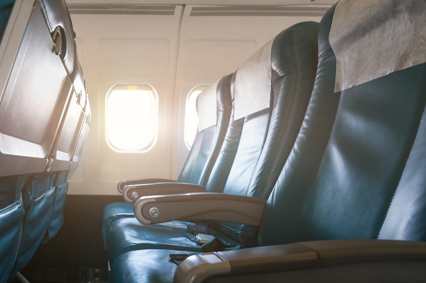 Interior of airplane with empty seats
