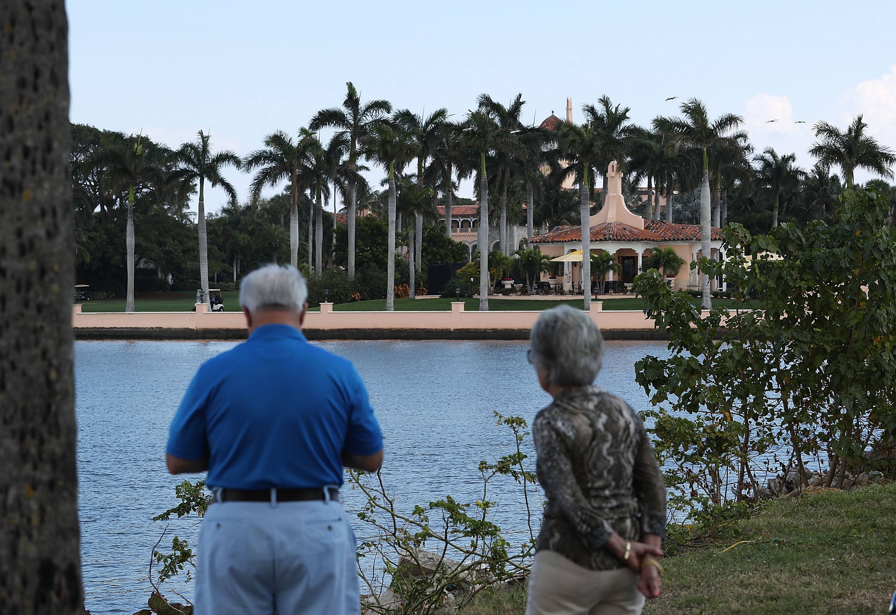 People look at the Mar-a-Lago Resort.