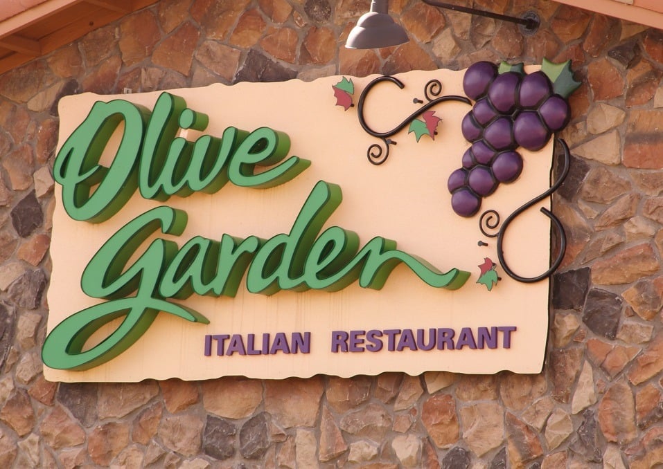 The Olive Garden Sign is on the rock exterior of the building