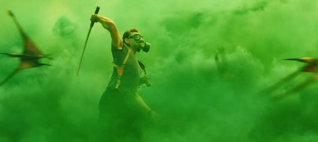Tom Hiddleston swings a machete in Kong: Skull Island