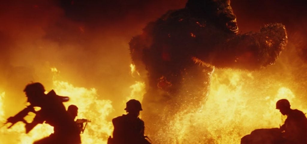 Kong fights off soldiers in Skull Island