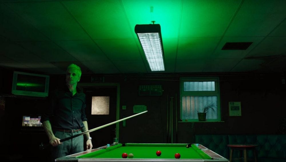 Johnny Lee Miller by a pool table in T2: Trainspotting