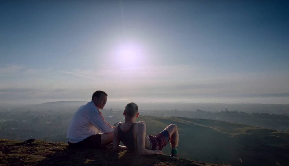Mark and Spud at the top of a hill in T2: Trainspotting