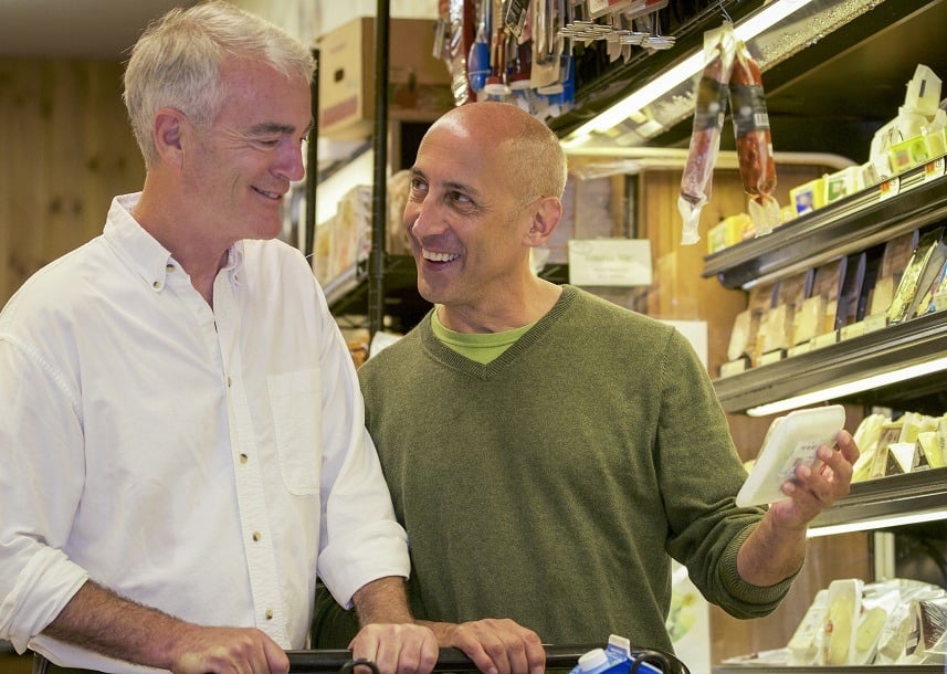 Senior couple shopping for groceries