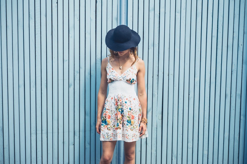 A young woman wearing a summer dress