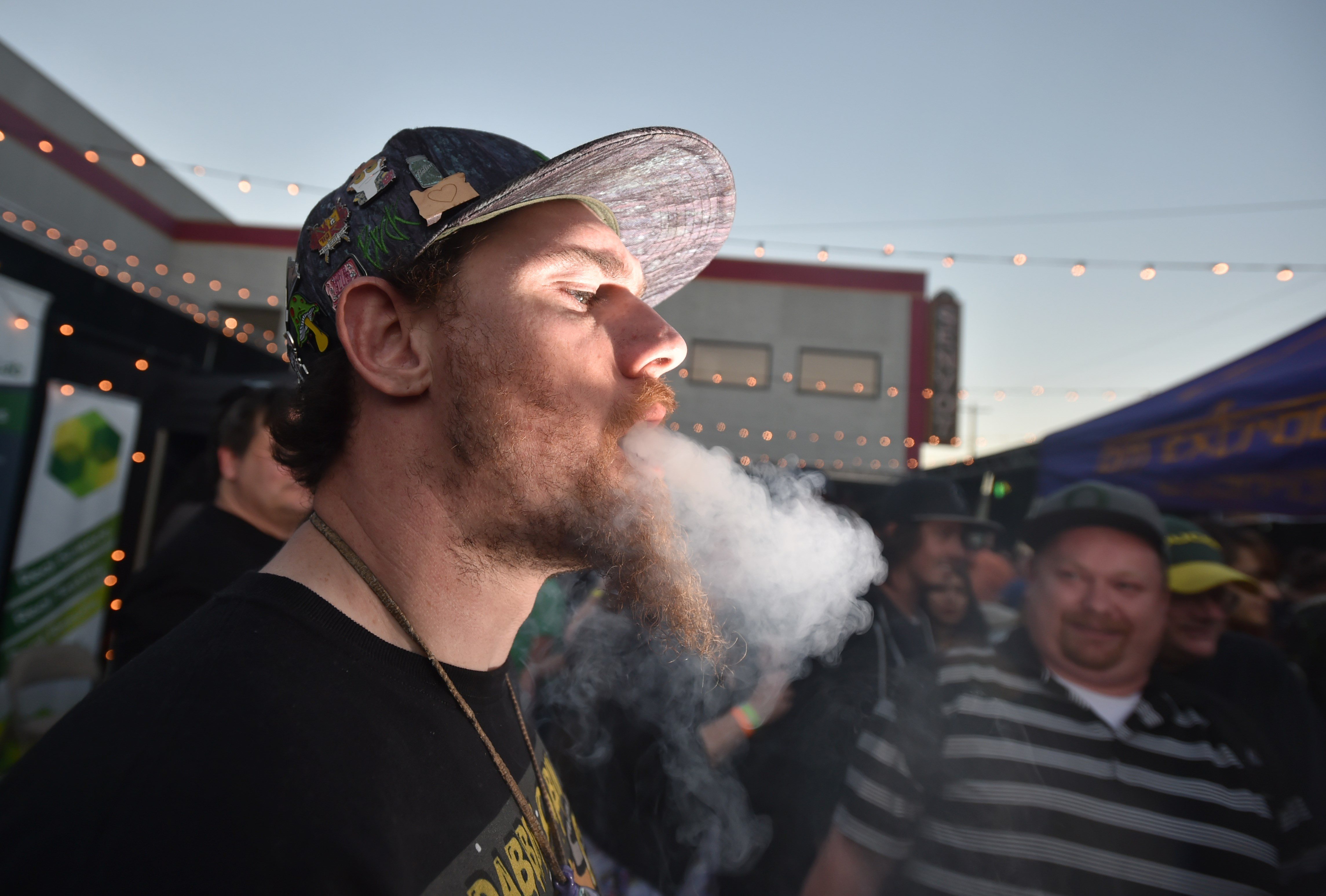 A man smokes marijuana at a cannabis competition in Portland, Oregon.