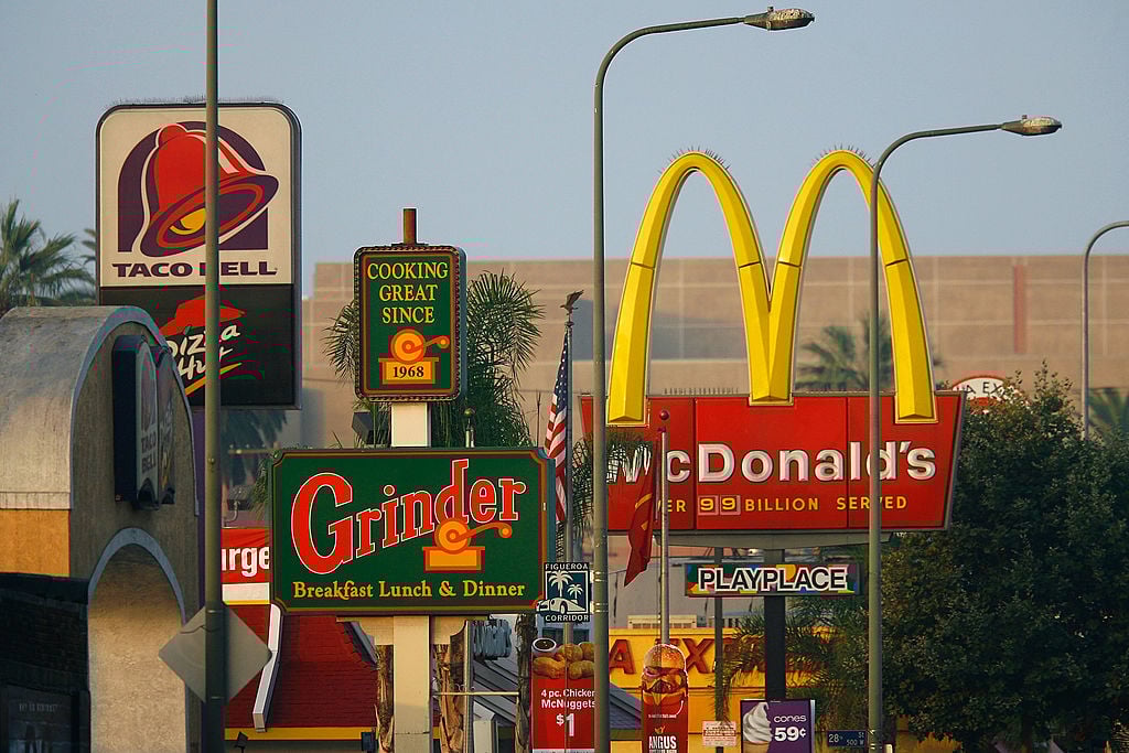 fast food signs all clustered together fast food signs