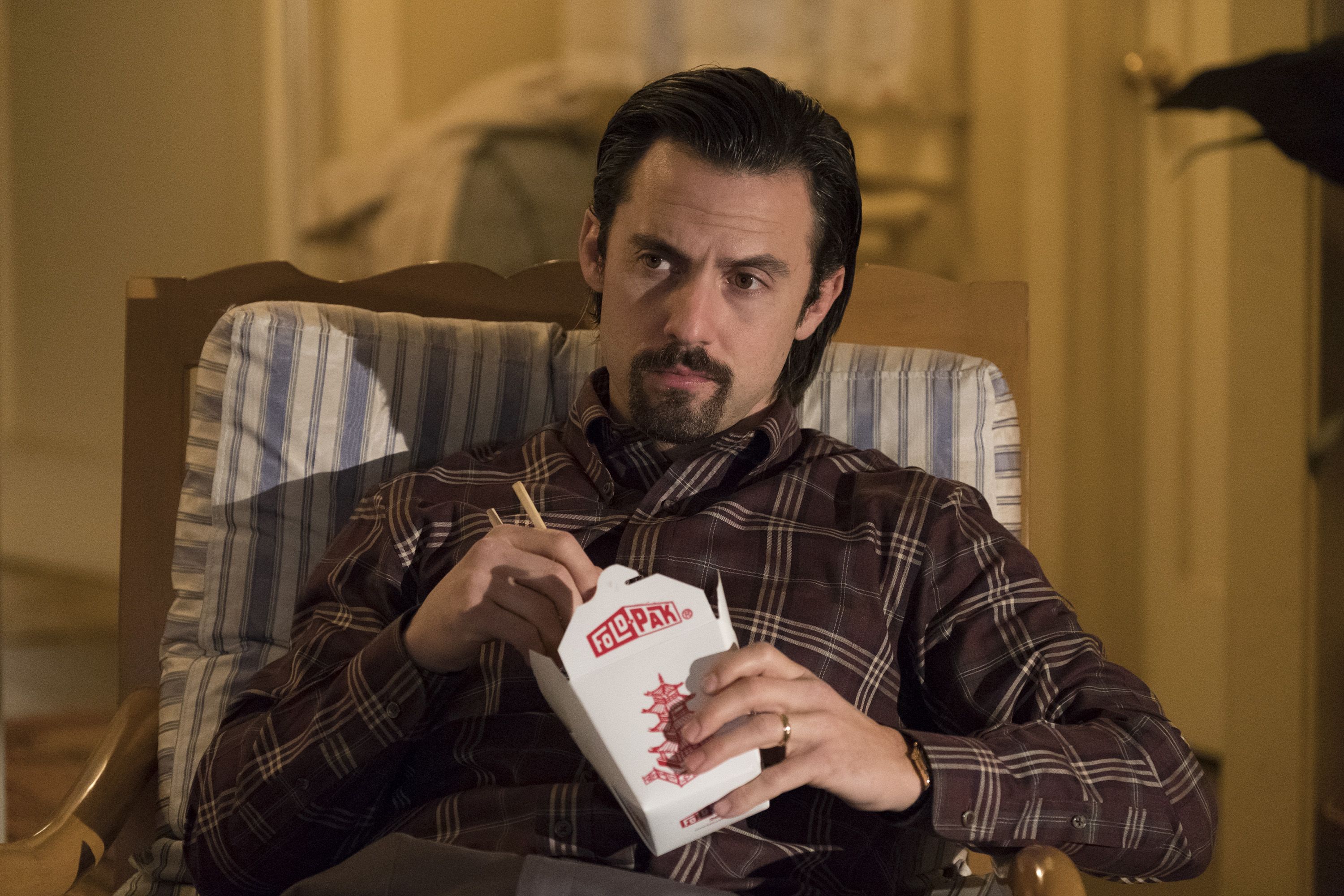 Milo Ventimiglia's Jack Pearson eats Chinese food in a scene from NBC's This is Us