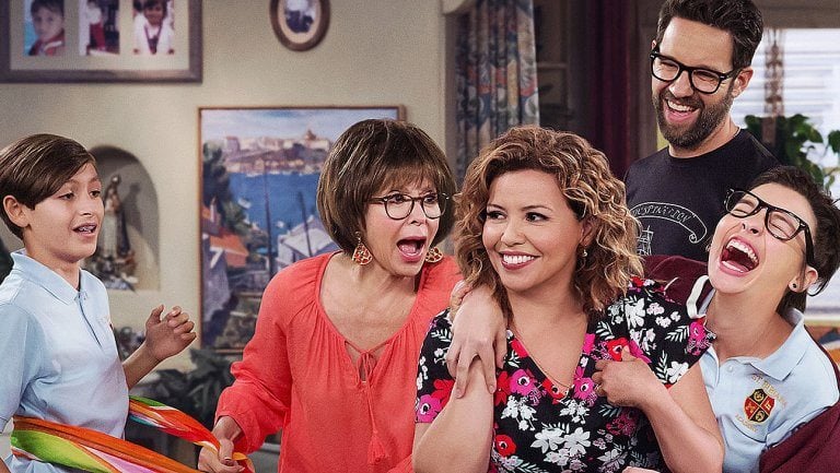 The cast of One Day at a Time laugh
