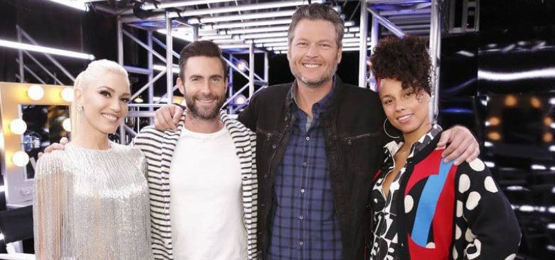 Blake Shelton, Gwen Stefani, Adam Levine, and Alicia Keys smile at the camera
