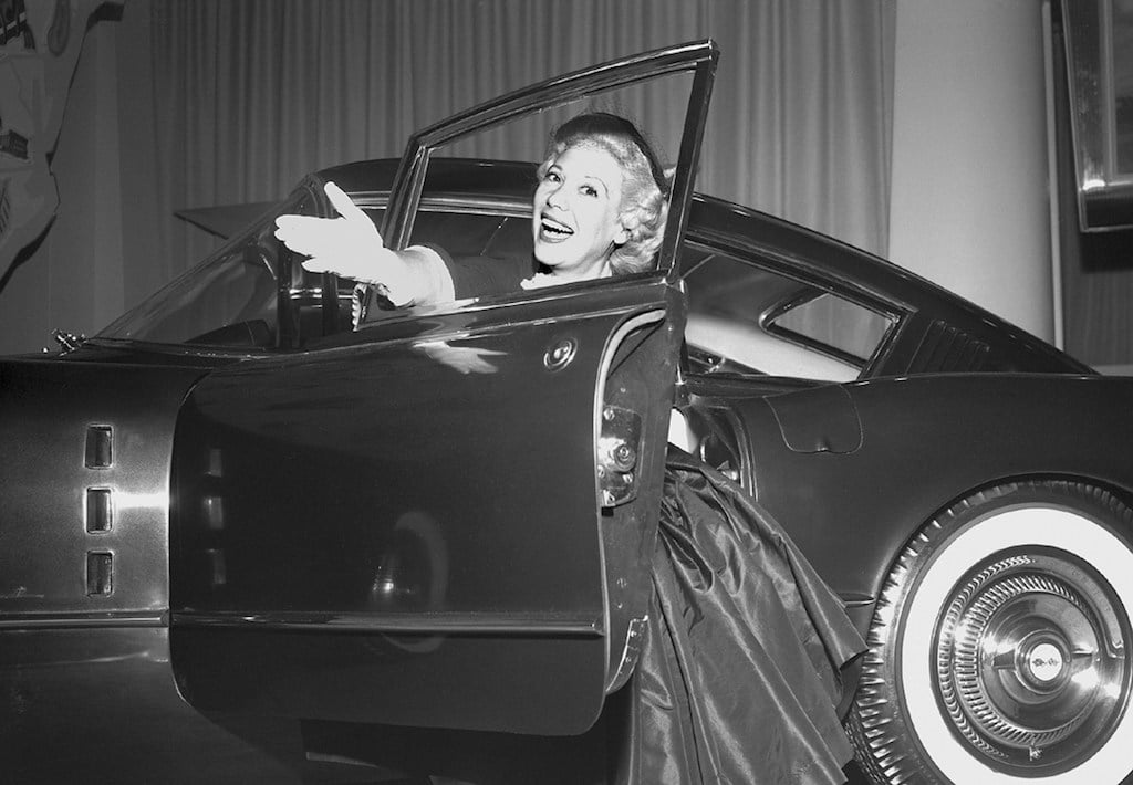 Actress Dina Shore with the 1954 Chevrolet Corvette Corvair concept