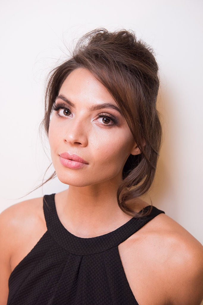 A model is seen backstage prior to the Teresita Orillac show