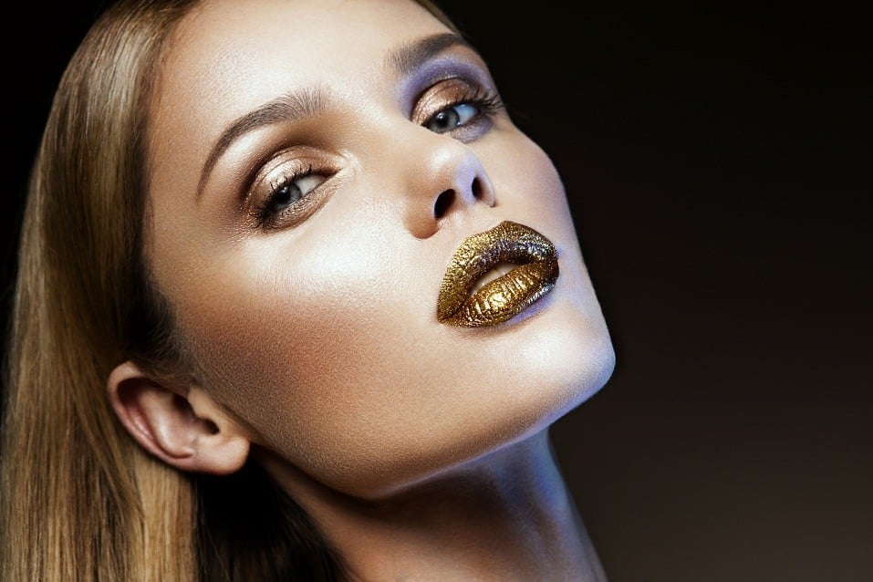 girl with gold glitter