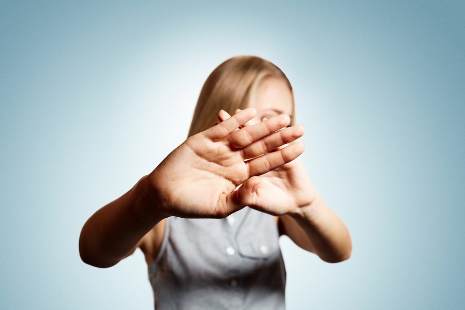 Woman closes hand in front of the camera Woman closes hand in front of the camera