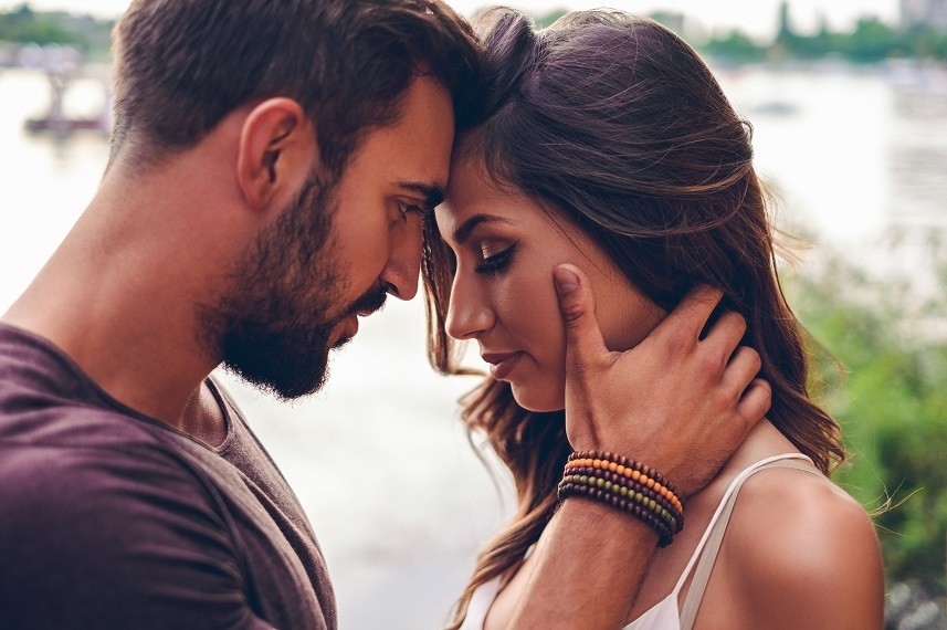 Couple touching with heads