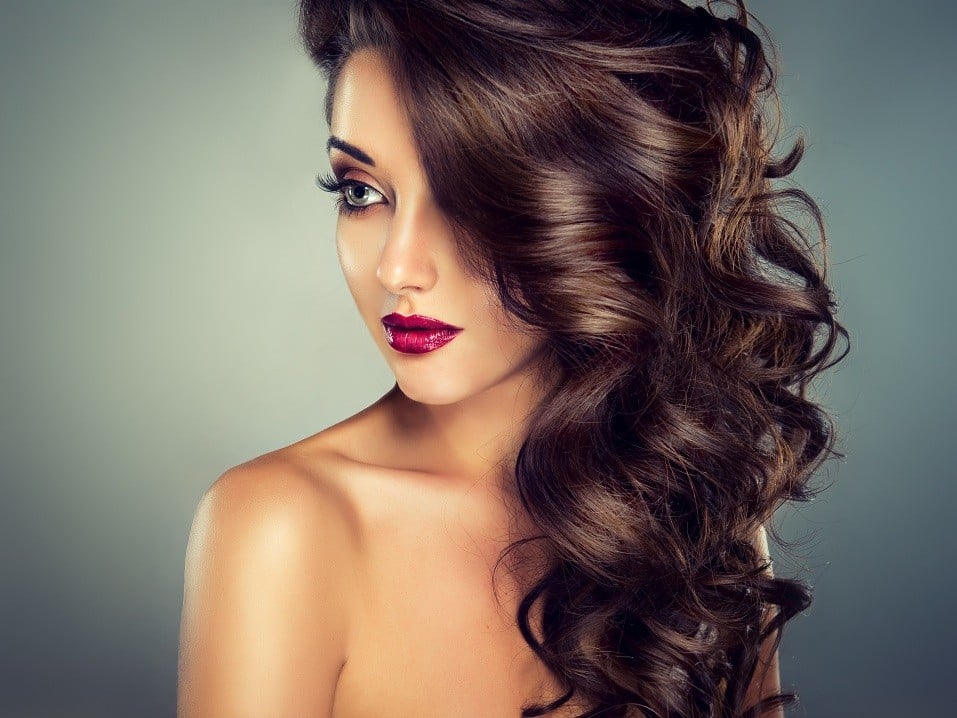Nice young girl model with dense, curly hair.Sensual look. young girl model with dense, curly hair