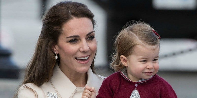 This is a closeup of Duchess Kate Middleton is holding Princess Charlotte.