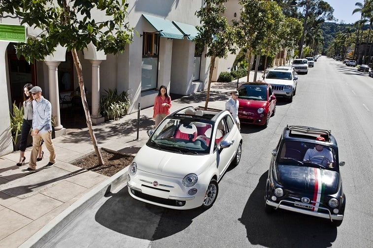 The 2017 Fiat 500c next to the classic car.