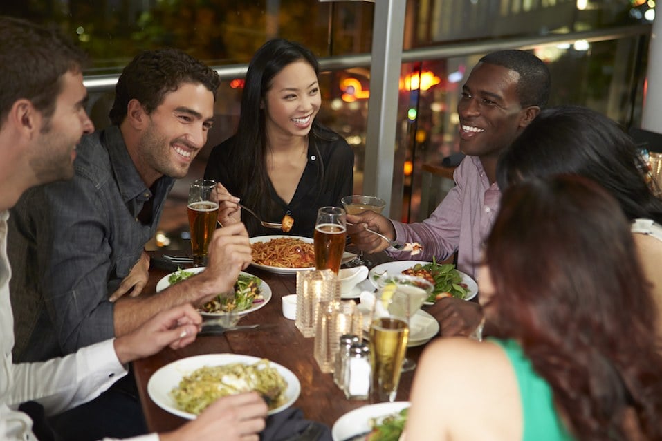 friends enjoy dinner