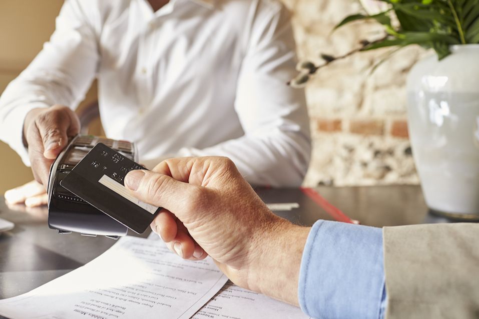 Guest making contactless card payment