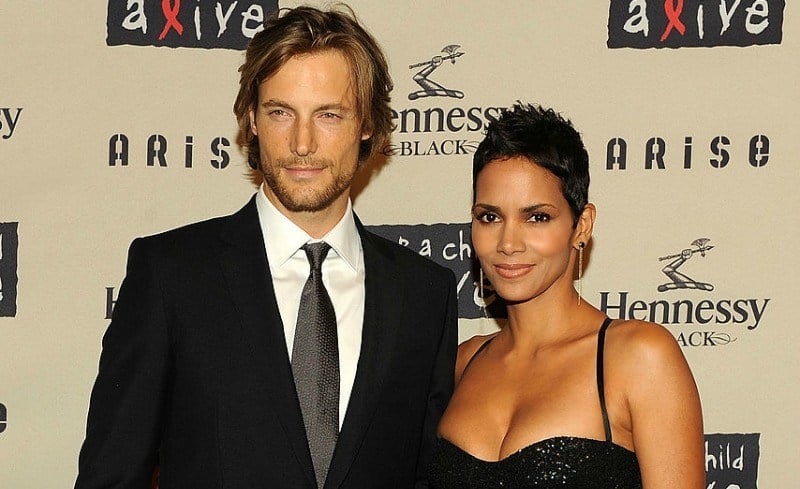 Halley Berry and Gabriel Aubry pose together on the red carpet.