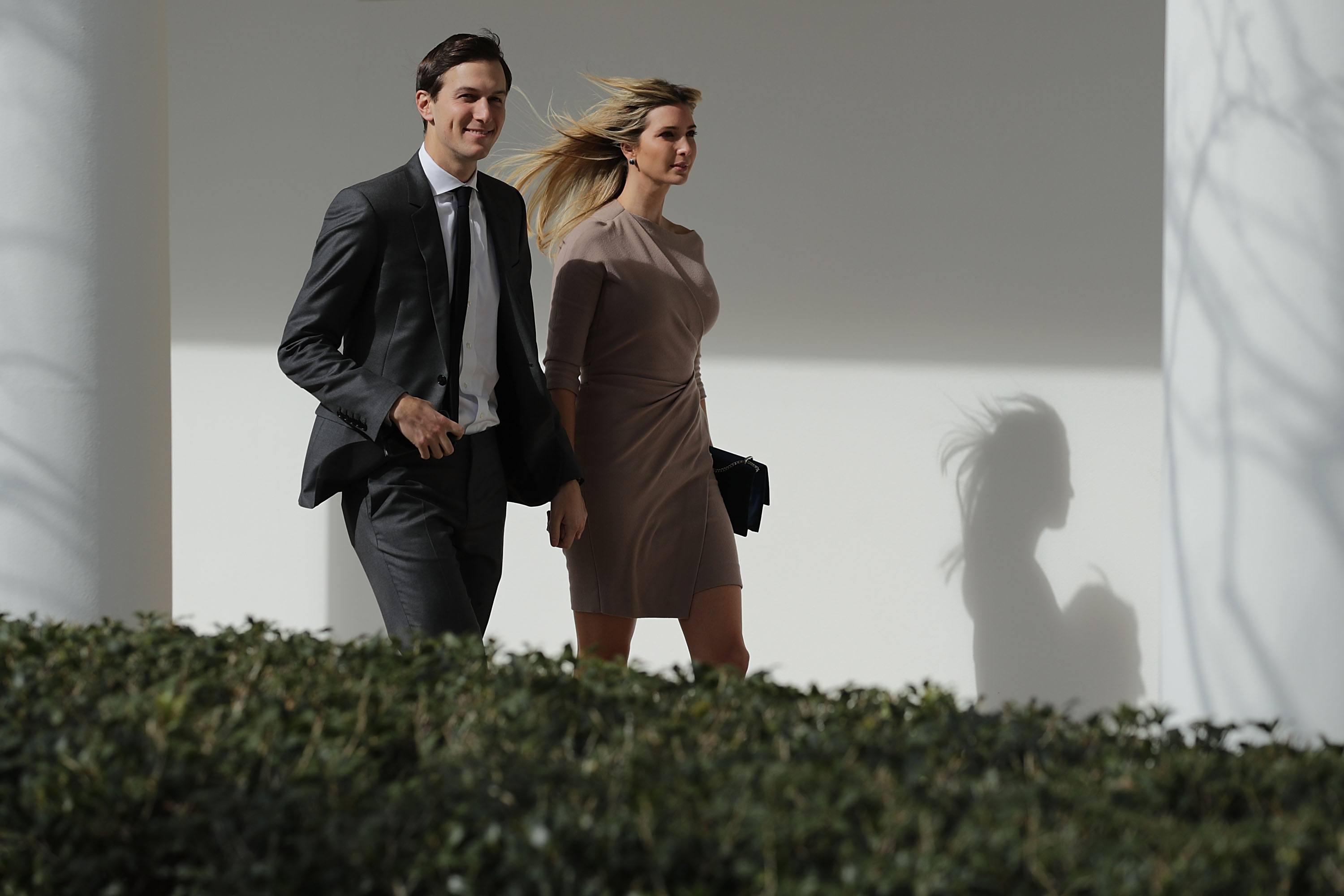 Jared Kushner and Ivanka Trump walking together Jared Kushner and Ivanka Trump walking together