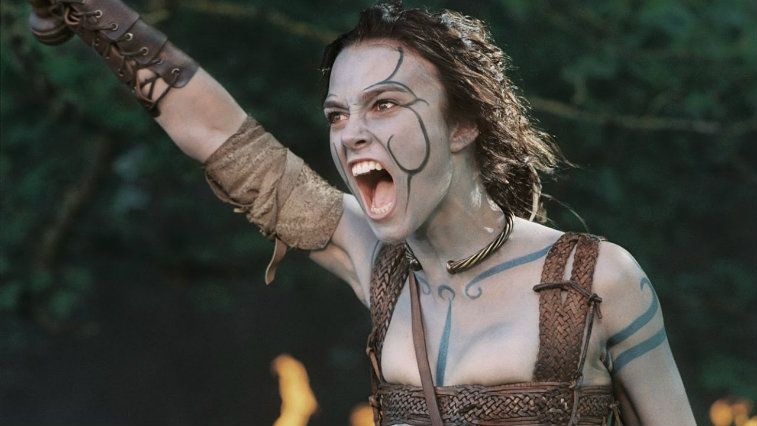 Keira Knightley covered in warpaint and delivering a battle cry in King Arthur