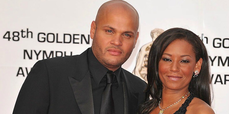 Mel B and Stephen Belafonte pose together on the red carpet.
