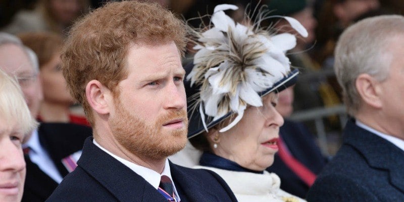 Prince Harry sits next to Queen Elizabeth II. Prince Harry sits next to Queen Elizabeth II.
