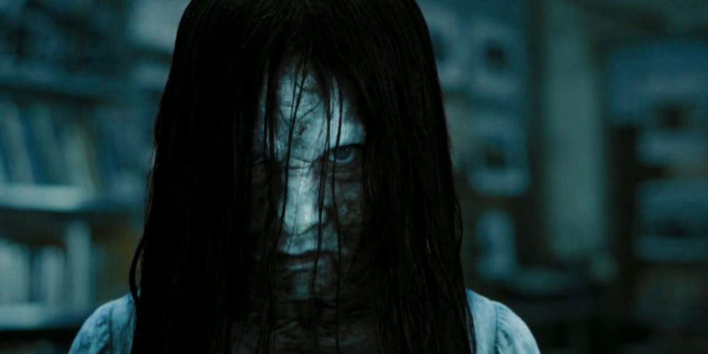 The ghost from Rings in close-up, staring straight into the camera