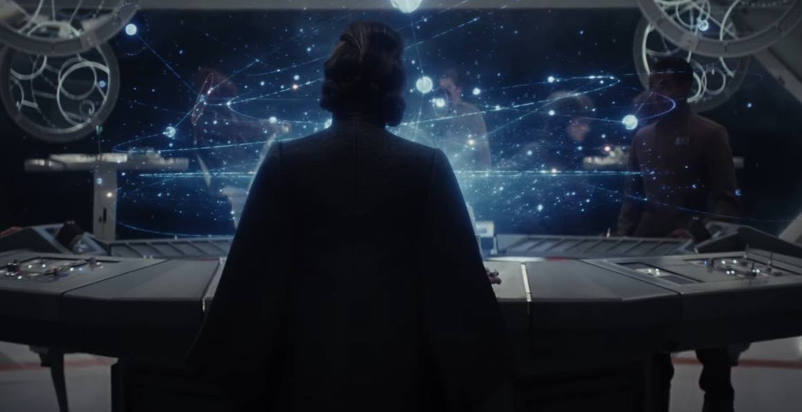 Leia looking at a holographic star charts
