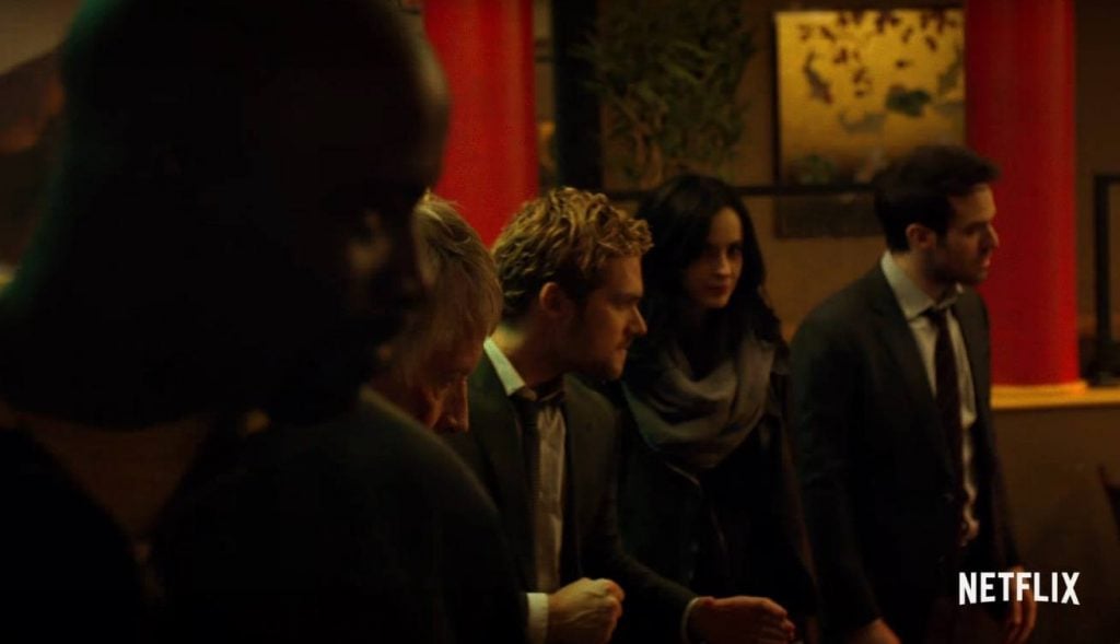 The Defenders prepare to fight, lined up together