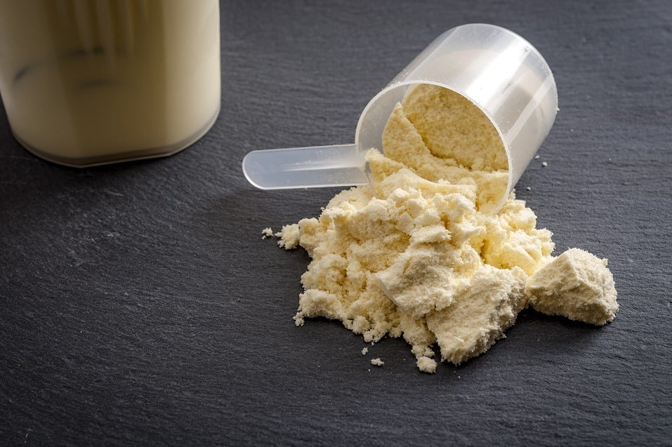 A spilled scoop of protein powder