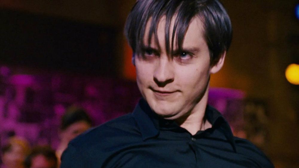 Tobey Maguire in a black shirt making a weird face in Spider-Man 3.