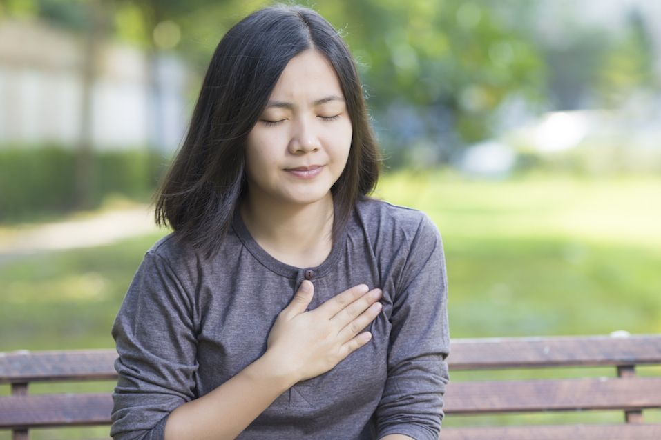 Woman has Chest Pain at Park