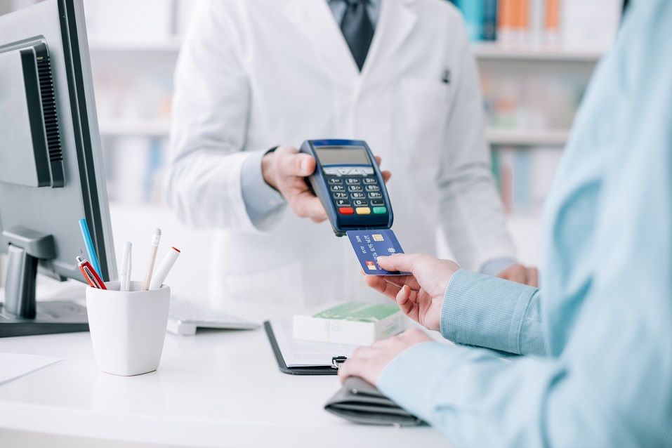 Woman at the pharmacy purchasing medicines