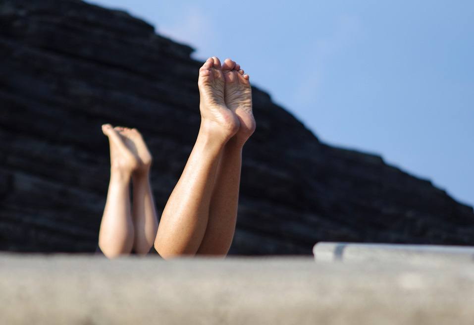 Feet extend upwards