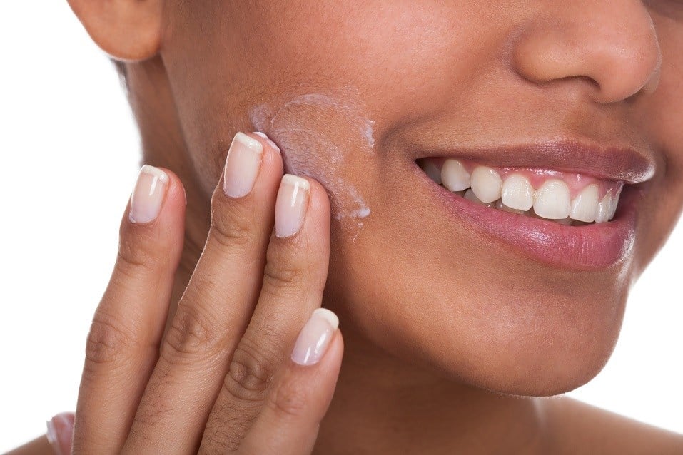 Woman Applying Cream