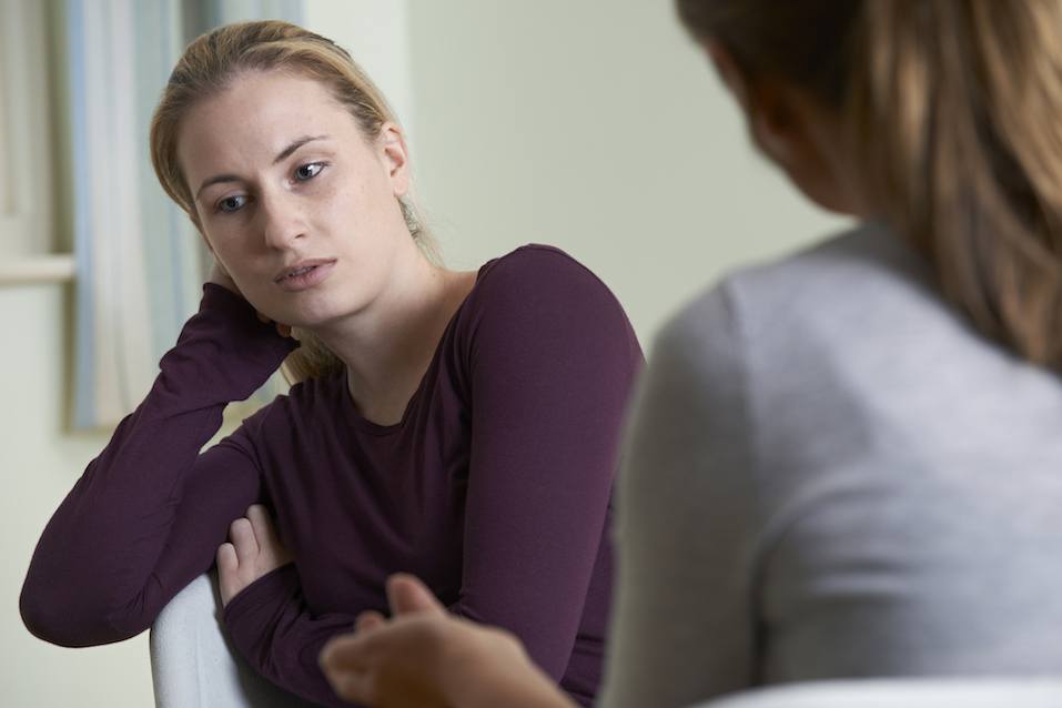 Young Woman Discussing Problems