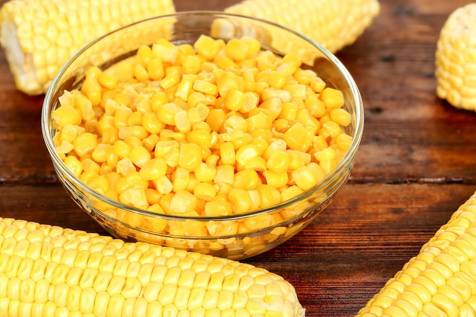 bowl of sweet corn on wooden table